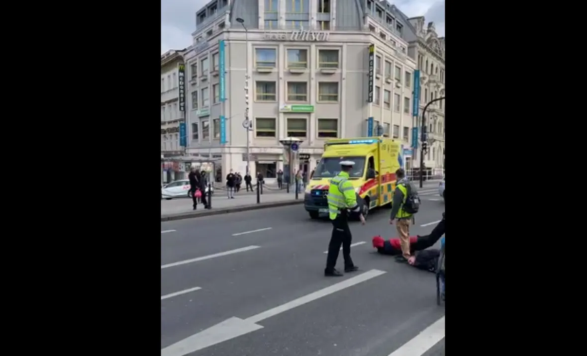 An ambulance that had to wait for the activists to be cleared from the road.